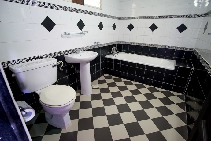 Imagen de la habitación del Hotel The Bala's Holiday Chalet. Foto 14