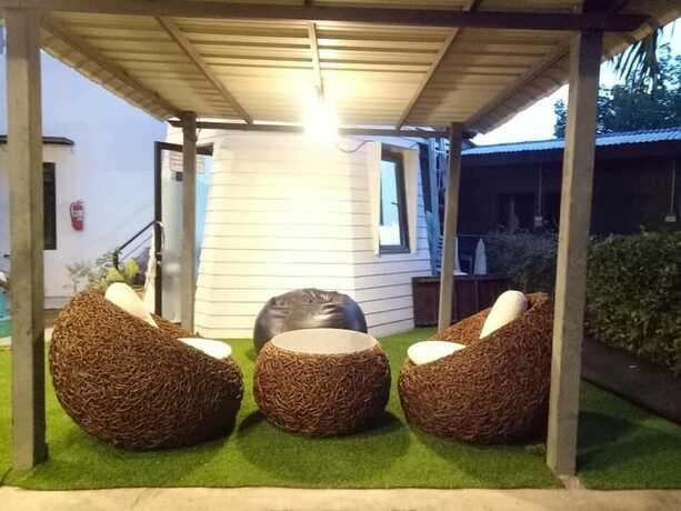 Imagen de la habitación del Hotel The Balcony At Chao Samran. Foto 2