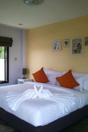 Imagen de la habitación del Hotel The Balcony At Chao Samran. Foto 17