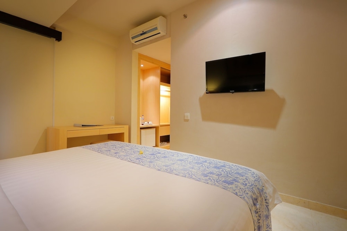 Imagen de la habitación del Hotel The Bali Bay View Suites and Villas. Foto 8