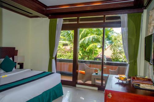 Imagen de la habitación del Hotel The Bali Dream Villa Resort Echo Beach Canggu. Foto 7