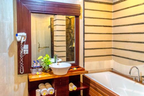 Imagen de la habitación del Hotel The Bali Dream Villa Resort Echo Beach Canggu. Foto 9