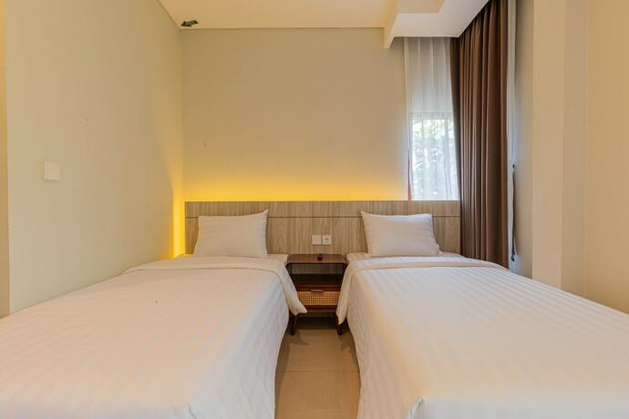 Imagen de la habitación del Hotel The Baliem. Foto 13
