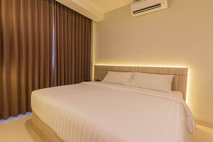 Imagen de la habitación del Hotel The Baliem. Foto 14