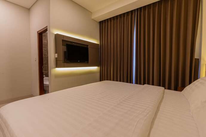 Imagen de la habitación del Hotel The Baliem. Foto 15