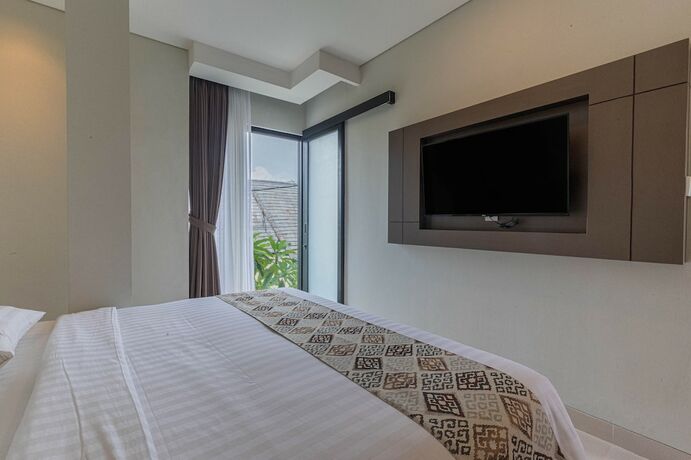 Imagen de la habitación del Hotel The Baliem. Foto 20
