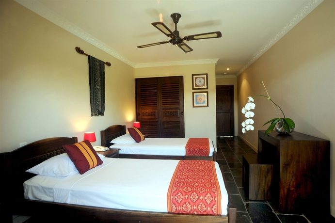Imagen de la habitación del Hotel The Balinese. Foto 4