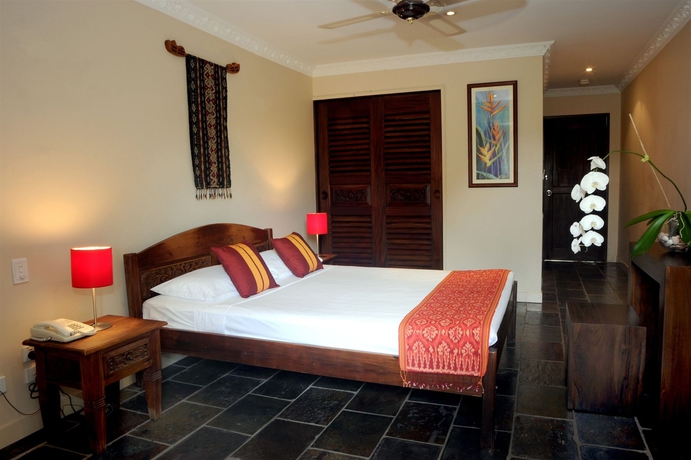 Imagen de la habitación del Hotel The Balinese. Foto 5