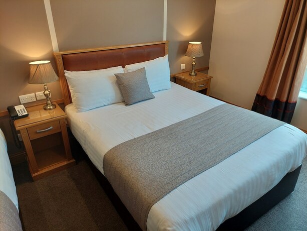 Imagen de la habitación del Hotel The Ballyliffin Lodge and Spa. Foto 17
