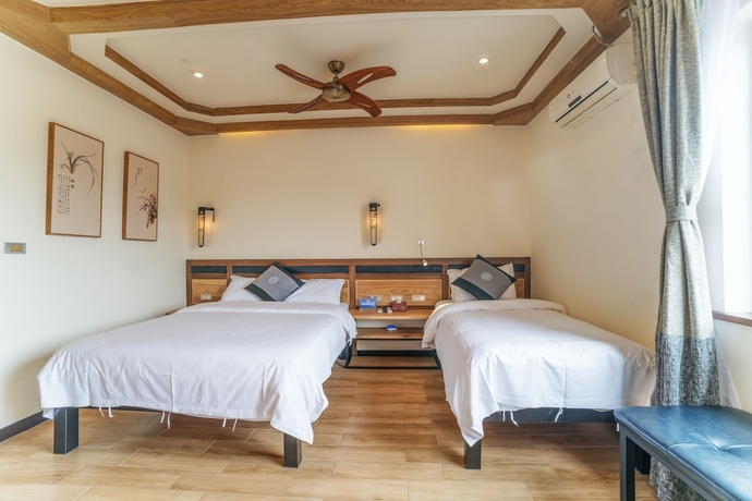 Imagen de la habitación del Hotel The Bamboo Leaf Yangshuo. Foto 14