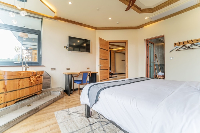 Imagen de la habitación del Hotel The Bamboo Leaf Yangshuo. Foto 17