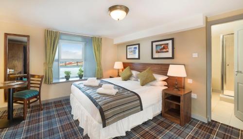 Imagen de la habitación del Hotel The Bamburgh Castle Inn. Foto 6