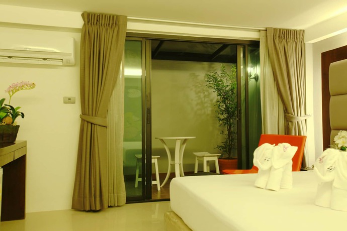 Imagen de los interiores del Hotel The Bangkok Major Suite. Foto 20