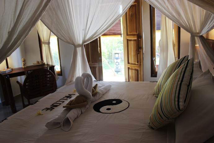 Imagen de la habitación del Hotel The Banyan Menjangan. Foto 16