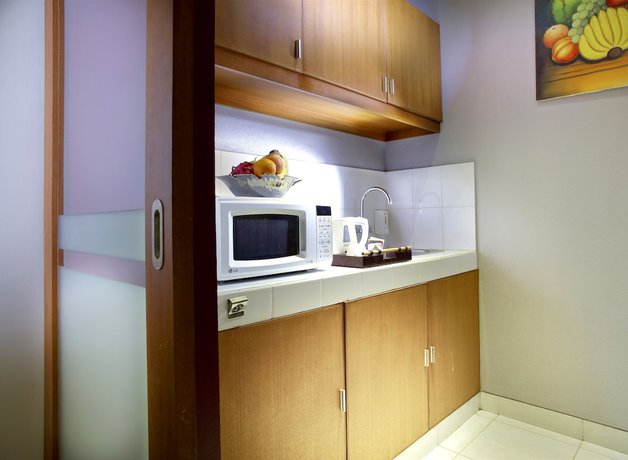 Imagen de la habitación del Hotel The Banyumas Villa. Foto 7