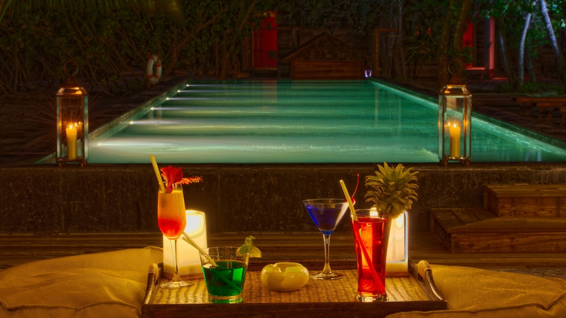 Imagen del bar/restaurante del Hotel The Barefoot Eco. Foto 2