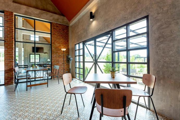 Imagen del bar/restaurante del Hotel The Barn Hua Hin. Foto 8
