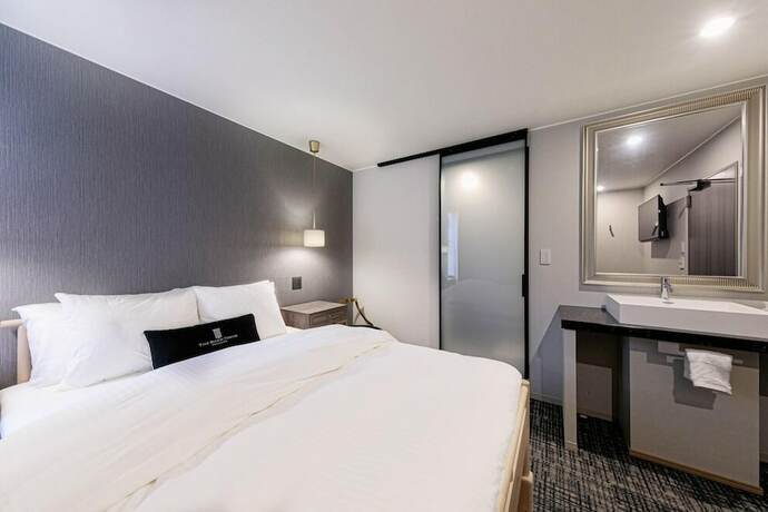 Imagen de la habitación del Hotel The Barn Tokyo. Foto 19