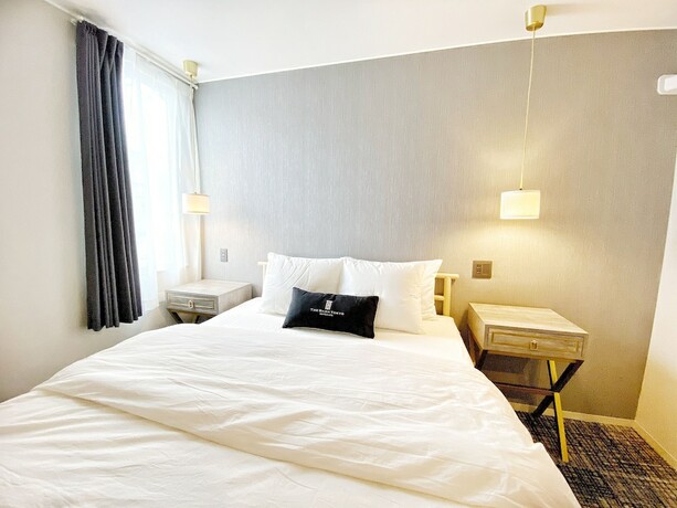 Imagen de la habitación del Hotel The Barn Tokyo. Foto 20