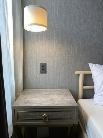 Imagen de la habitación del Hotel The Barn Tokyo. Foto 24