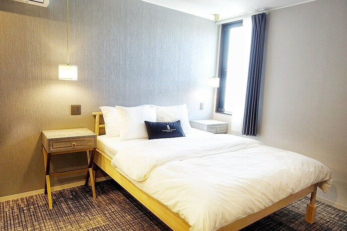 Imagen de la habitación del Hotel The Barn Tokyo. Foto 30