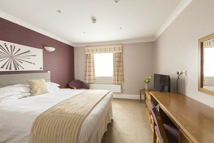 Imagen de la habitación del Hotel The Barns. Foto 20