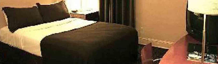 Imagen de la habitación del Hotel The Baron. Foto 4