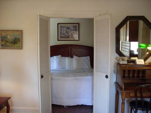 Imagen de la habitación del Hotel The Baroness. Foto 11