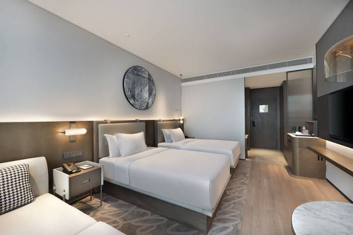 Imagen de la habitación del Hotel The Barony Jinan East. Foto 1
