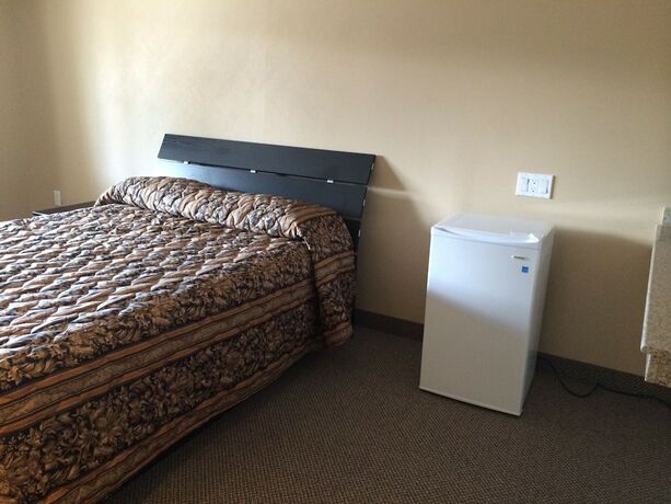 Imagen de la habitación del Hotel The Barrie Motel. Foto 8
