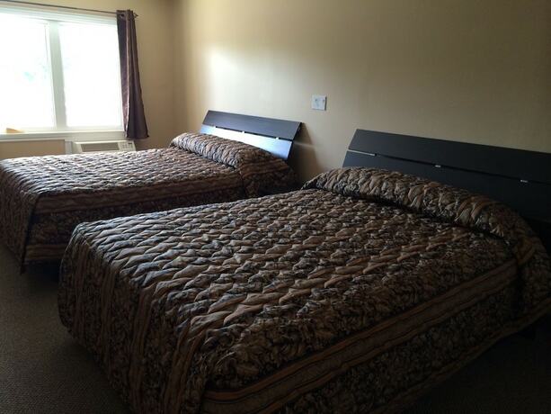 Imagen de la habitación del Hotel The Barrie Motel. Foto 9