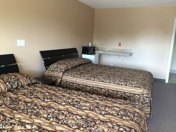 Imagen de la habitación del Hotel The Barrie Motel. Foto 10