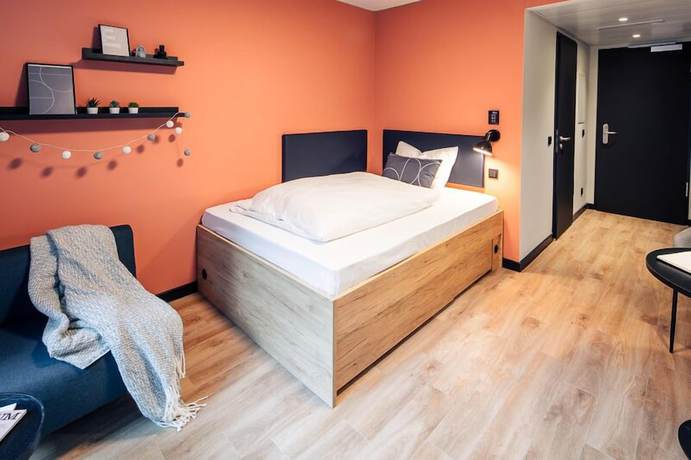 Imagen de la habitación del Hotel The Base Munich. Foto 3