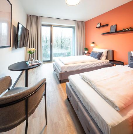 Imagen de la habitación del Hotel The Base Munich. Foto 5