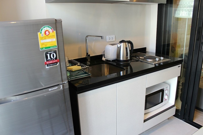 Imagen de la habitación del Hotel The Base Pattaya Horizon Inn. Foto 11