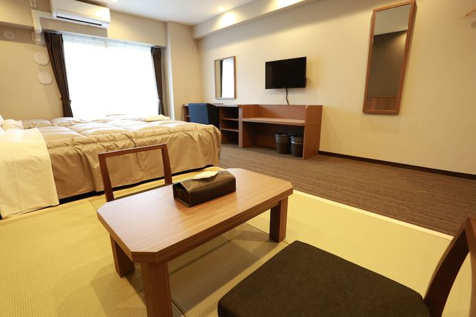 Imagen de la habitación del Hotel The Base Sakaihigashi Apartment. Foto 2