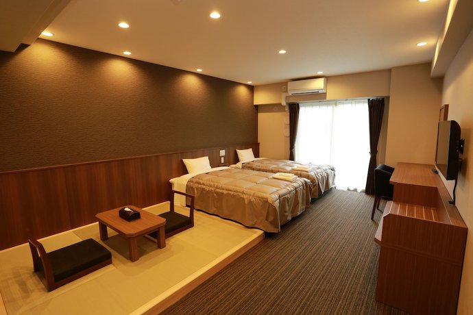 Imagen de la habitación del Hotel The Base Sakaihigashi Apartment. Foto 5