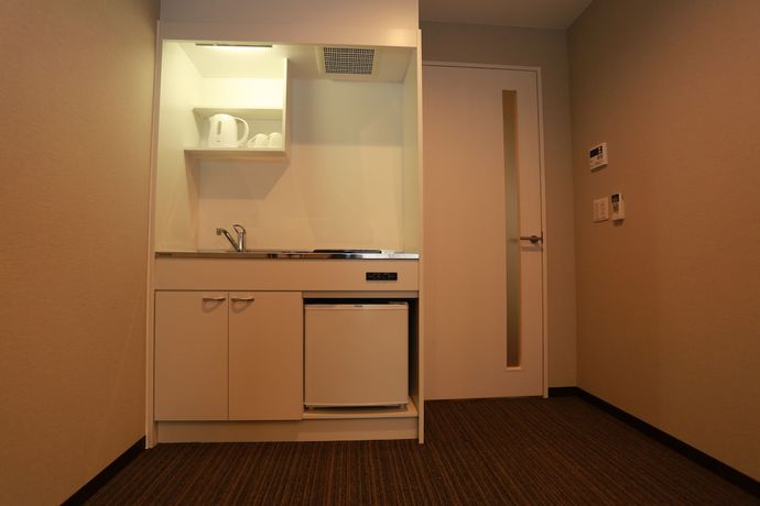 Imagen de la habitación del Hotel The Base Sakaihigashi Apartment. Foto 12