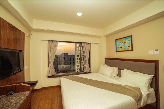 Imagen de la habitación del Hotel The Basil Park. Foto 8