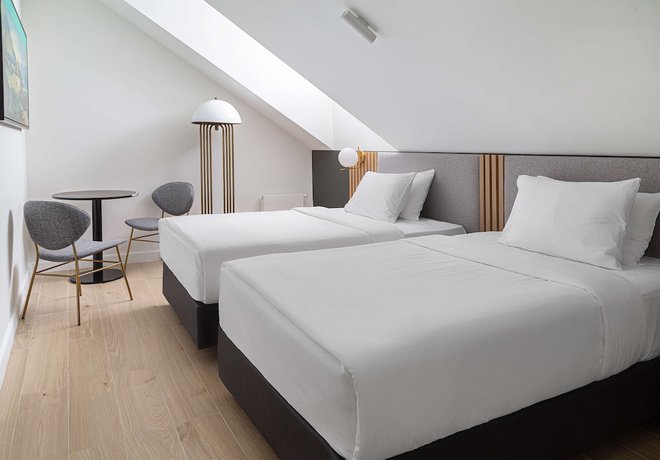Imagen de la habitación del Hotel The Basilian Minsk, Curio Collection By Hilton. Foto 3