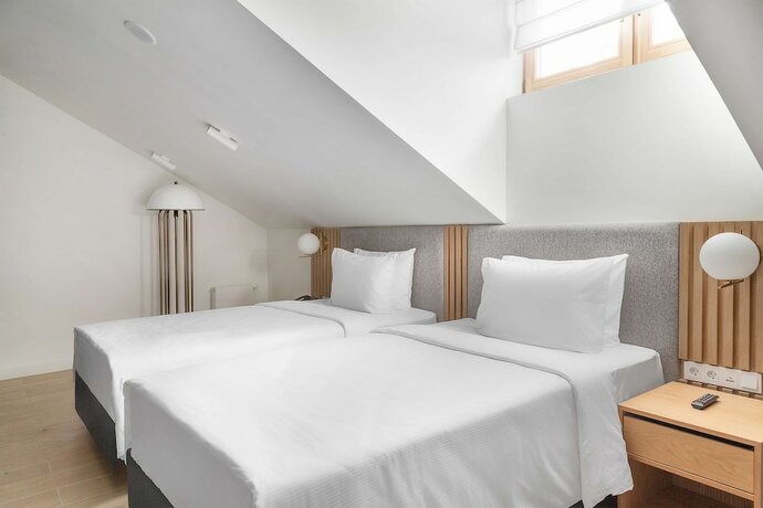 Imagen de la habitación del Hotel The Basilian Minsk, Curio Collection By Hilton. Foto 13