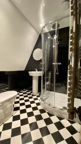 Imagen de la habitación del Hotel The Bath Rooms. Foto 9