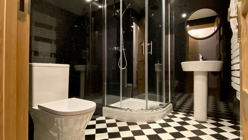 Imagen de la habitación del Hotel The Bath Rooms. Foto 15