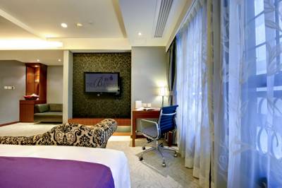 Imagen de la habitación del Hotel The Bauhinia Central. Foto 6