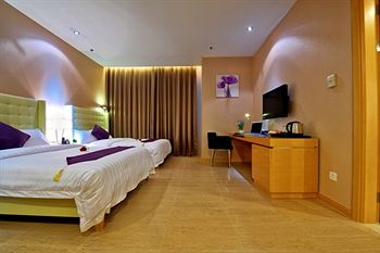 Imagen de la habitación del Hotel The Bauhinia, Shenzhen. Foto 11