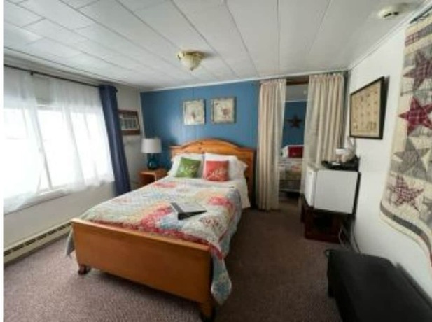 Imagen de la habitación del Hotel The Bavarian Manor. Foto 14