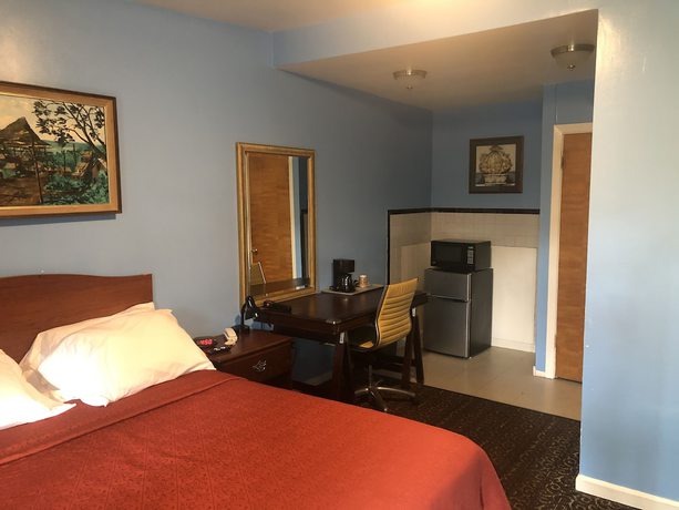 Imagen de la habitación del Hotel The Bay Inn. Foto 10