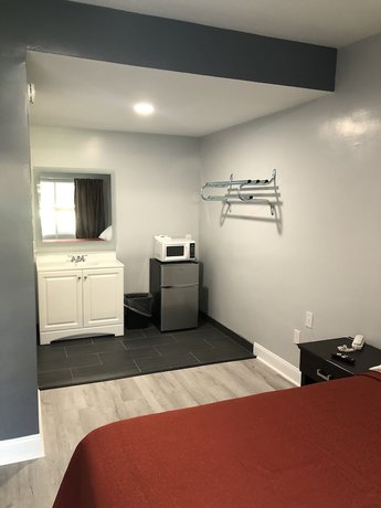 Imagen de la habitación del Hotel The Bay Inn. Foto 11