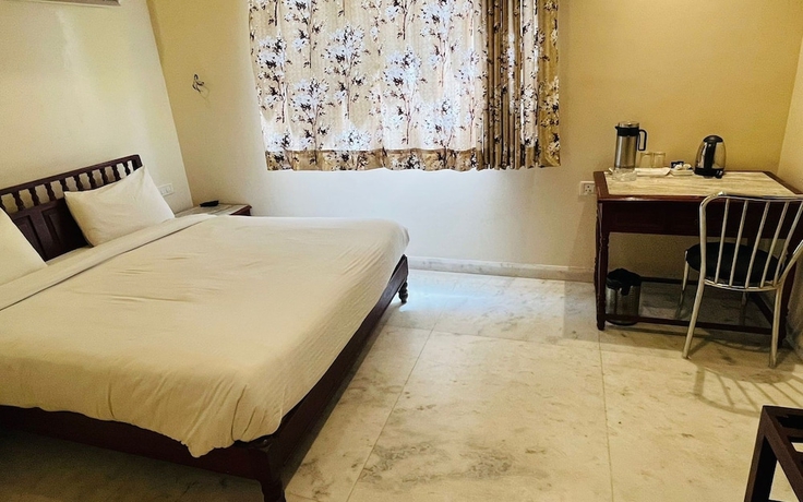 Imagen de la habitación del Hotel The Bayan Elegance. Foto 11