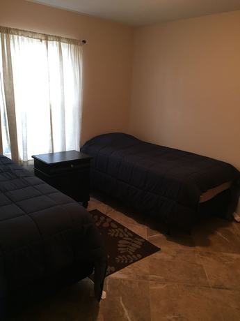 Imagen de la habitación del Hotel The Bays Edge. Foto 14